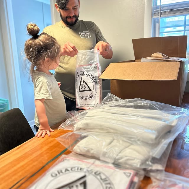 Helping Dad with all the kids gi’s that just came in! 

Were celebrating all the famili…