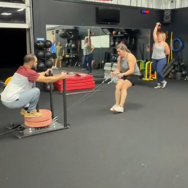 Some gyms count reps.
We count laughs.

Heavy sleds.
Strong carries.
Coaches who don’t …