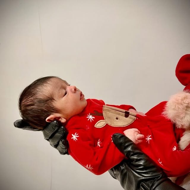 Military spouse writer and first-time mom Lizzy navigated pregnancy while her husband w…