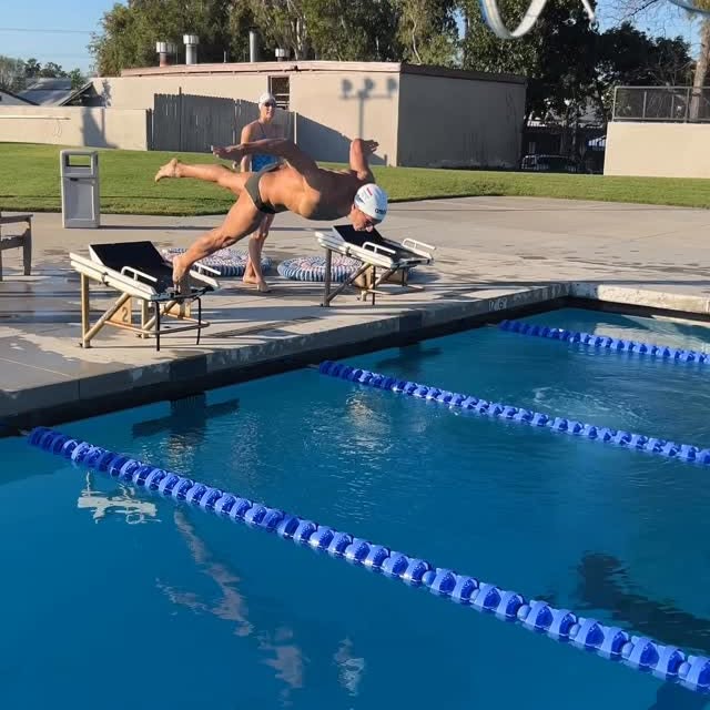 Working on the “pike”. Lifting the hips mid-air to have a better entrance into the wate…